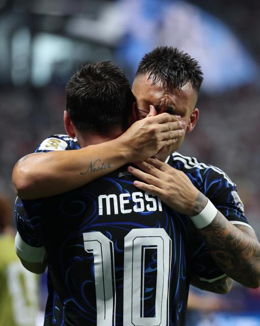 (260716) -- ATLANTA, July 16, 2026 (Xinhua) -- Lautaro Martinez (R) of Argentina celebrates a goal with Lionel Messi of Argentina during the semifinal match between Argentina and England at the 2026 FIFA World Cup at Atlanta Stadium in Atlanta, the United States, July 15, 2026. (Xinhua/Li Ming)