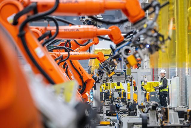 (260718) -- HANGZHOU, July 18, 2026 (Xinhua) -- An employee works on the production line in a smart factory of Noblelift, a manufacturer and service provider of material handling equipment and logistics solutions, in Changxing County of Huzhou City, east China's Zhejiang Province, March 16, 2026. (Photo by Tan Yunfeng/Xinhua)