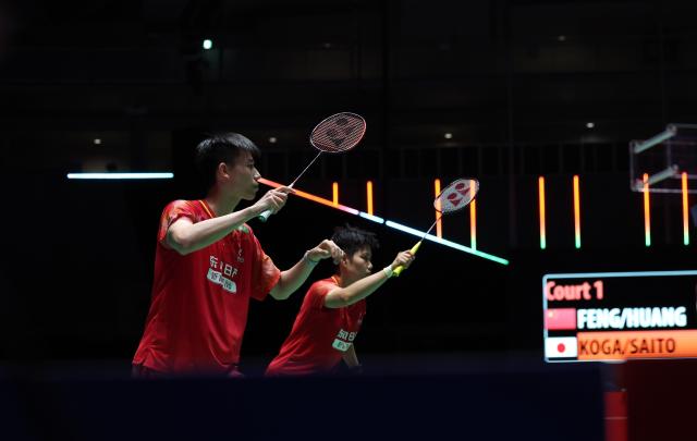 (260718) -- TOKYO, July 18, 2026 (Xinhua) -- Feng Yanzhe (L)/Huang Dongping compete during the mixed doubles semifinal match between Feng Yanzhe/Huang Dongping of China and Koga Akira/Saito Natsu of Japan at the Japan Badminton Open 2026 in Tokyo, Japan, July 18, 2026. (Xinhua/Yue Chenxing)
