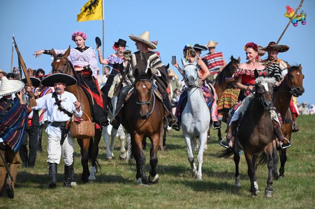 (260718) -- GRUNWALD, July 18, 2026 (Xinhua) -- People in costumes ride horses during the Grunwald Days festival in Grunwald, Poland, on July 17, 2026. The annual Grunwald Days festival commemorates the Battle of Grunwald in 1410, which is regarded as one of the most important battles in Polish history. The festival runs from Wednesday through Sunday this year. (Photo by Alexey Vitvitsky/Xinhua)