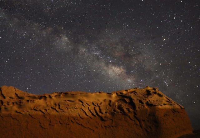 (260719) -- FAYOUM, July 19, 2026 (Xinhua) -- This photo taken on July 18, 2026 shows the Milky Way stretching across the sky above the desert in Fayoum, Egypt. (Xinhua/Ahmed Gomaa)