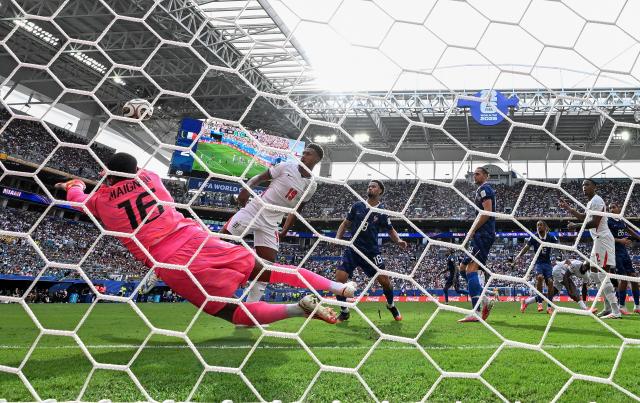 (260719) -- MIAMI, July 19, 2026 (Xinhua) -- Mike Maignan, goalkeeper of France, makes a save during the bronze final match between France and England at the 2026 FIFA World Cup in Miami, the United States, July 18, 2026. (Xinhua/Chen Yichen)