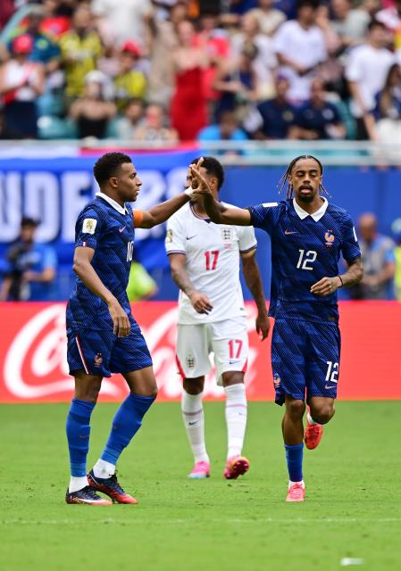 (260719) -- MIAMI, July 19, 2026 (Xinhua) -- Bradley Barcola (front R) of France celebrates with his teammate Kylian Mbappe during the bronze final match between France and England at the 2026 FIFA World Cup in Miami, the United States, July 18, 2026. (Xinhua/Chen Yichen)