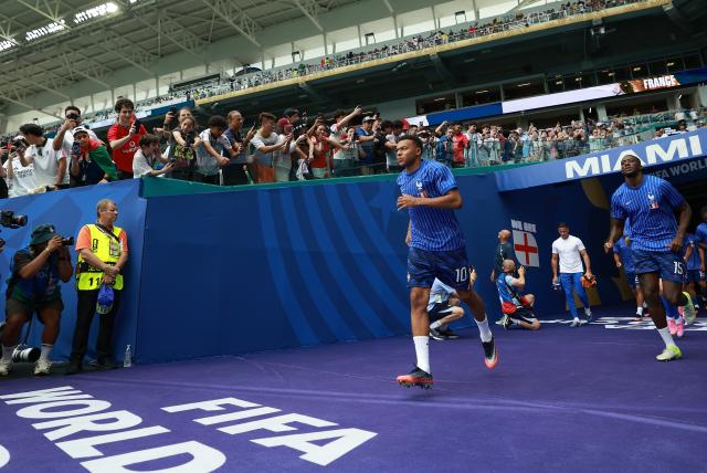 (260719) -- MIAMI, July 19, 2026 (Xinhua) -- Kylian Mbappe (C) of France enters the field for the bronze final match between France and England at the 2026 FIFA World Cup in Miami, the United States, July 18, 2026. (Xinhua/Hu Xingyu)