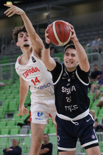 (260719) -- LJUBLJANA, July 19, 2026 (Xinhua) -- Adrian Torres (L) of Spain vies with Aleksa Stanojevic of Serbia during the semifinal match between Serbia and Spain at FIBA U20 EuroBasket 2026 in Ljubljana, Slovenia, July 18, 2026. (Photo by Zeljko Stevanic/Xinhua)