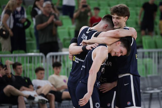 (260719) -- LJUBLJANA, July 19, 2026 (Xinhua) -- Players of Serbia celebrate victory after the semifinal match between Serbia and Spain at FIBA U20 EuroBasket 2026 in Ljubljana, Slovenia, July 18, 2026. (Photo by Zeljko Stevanic/Xinhua)