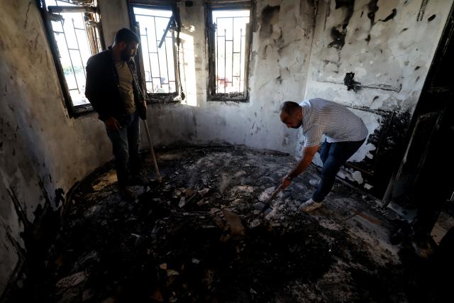 (260719) -- NABLUS, July 19, 2026 (Xinhua) -- Palestinians inspect damages after Israeli settlers set fire to a house in the town of Tell, southwest of Nablus in the West Bank, on July 18, 2026. (Photo by Nidal Eshtayeh/Xinhua)