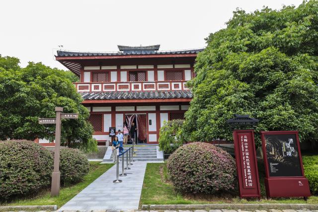 (260719) -- MAANSHAN, July 19, 2026 (Xinhua) -- This photo taken on July 18, 2026 shows a view of the Three Kingdoms Zhu Ran Family Cemetery Museum in Maanshan, east China's Anhui Province.
  The museum currently exhibits rare lacquered wooden treasures unearthed from the tomb of general Zhu Ran in the Eastern Wu Kingdom during the Three Kingdoms period (220-280). Among these masterpieces, lacquered wooden clogs are displayed to the public for the first time since they were excavated more than 40 years ago. (Photo by Wang Wensheng/Xinhua)