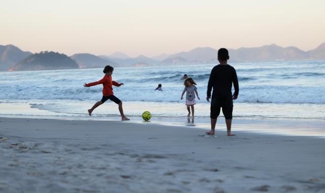 (260719) -- RIO DE JANEIRO, July 19, 2026 (Xinhua) -- Children have fun at the Copacabana Beach in Rio de Janeiro, Brazil, July 17, 2026. Located on the Atlantic coast, Rio de Janeiro witnesses the landscapes of Atlantic rainforest, steep mountains and urban coastline in the city, forming its iconic landscape style. 
   In July 2012, some scenic spots in the city such as the Tijuca National Park, the Guanabara Bay, the Sugarloaf Mountain and the Copacabana Beach were inscribed on the World Heritage List by UNESCO under the name "Rio de Janeiro: Carioca Landscapes between the Mountain and the Sea." (Xinhua/Jin Haoyuan)