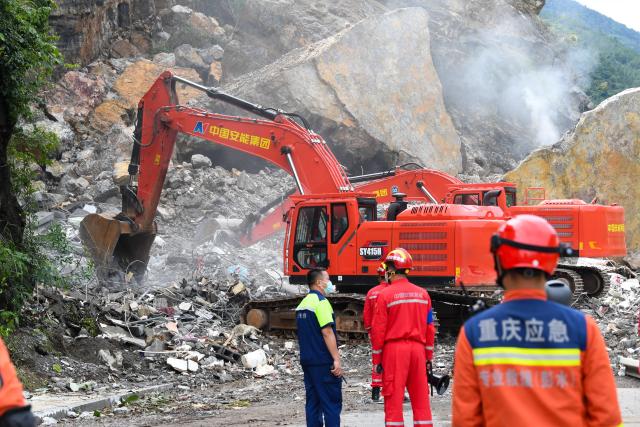(260719) -- CHONGQING, July 19, 2026 (Xinhua) -- Rescuers work at the site of a mountain collapse in Pengshui Miao and Tujia Autonomous County of Chongqing, southwest China, July 19, 2026. A rainfall-induced mountain collapse occurred at 9:08 a.m. on Friday in the Hanjia sub-district of Pengshui, burying more than 10 residential buildings, while leaving some local residents trapped and unaccounted for.
   China activated a Level-II national emergency response for geological disasters. Multiple rescue forces including emergency response, fire control and public security rushed to the scene and launched full-scale search and rescue operations, while local residents also volunteered to take part in the rescue efforts. (Xinhua/Tang Yi)