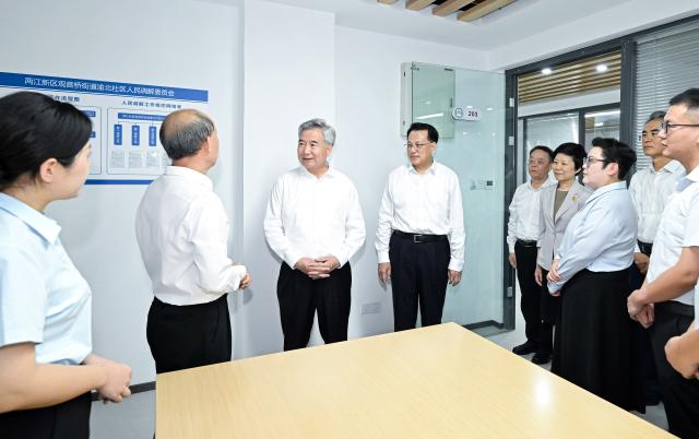 (260719) -- CHONGQING, July 19, 2026 (Xinhua) -- Li Xi, a member of the Standing Committee of the Political Bureau of the Communist Party of China (CPC) Central Committee and secretary of the CPC Central Commission for Discipline Inspection, visits a local community, where he meets with officials and residents and listens to their suggestions on improving Party conduct, enforcing Party discipline and combating corruption, in southwest China's Chongqing Municipality, July 15, 2026. Li made an inspection tour in southwest China's Chongqing Municipality from Wednesday to Friday. (Xinhua/Yue Yuewei)