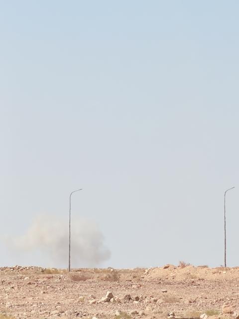 (260719) -- AQABA, July 19, 2026 (Xinhua) -- Dust and smoke rise after a missile falls in a remote area in the southern city of Aqaba, Jordan on July 19, 2026. Earlier Sunday, Jordan's state broadcaster the Jordan Radio and Television Corporation said on social media platform X that the country's air defenses intercepted three Iranian missiles, while a fourth one fell in a remote area in southern Jordan, causing no casualties or material damage. (Xinhua)