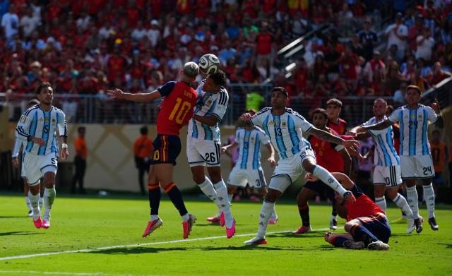 (260720) -- NEW JERSEY, July 20, 2026 (Xinhua) -- Dani Olmo (Top L) of Spain competes during the final match between Spain and Argentina at the 2026 FIFA World Cup at the New York New Jersey Stadium, the United States, July 19, 2026. (Xinhua/Jia Haocheng)