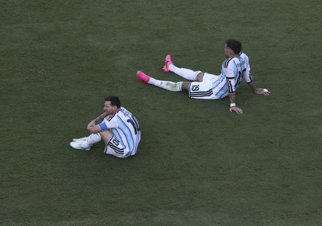 (260720) -- NEW JERSEY, July 20, 2026 (Xinhua) -- Lionel Messi (L) and Nicolas Otamendi of Argentina reacts after the final match between Spain and Argentina at the 2026 FIFA World Cup at the New York New Jersey Stadium, the United States, July 19, 2026. (Xinhua/Xu Zijian)