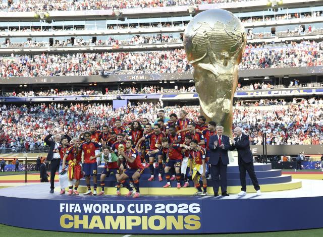 (260720) -- NEW JERSEY, July 20, 2026 (Xinhua) -- Team Spain celebrate during the awarding ceremony after the final match between Spain and Argentina at the 2026 FIFA World Cup at the New York New Jersey Stadium, the United States, July 19, 2026. (Xinhua/Li Ming)