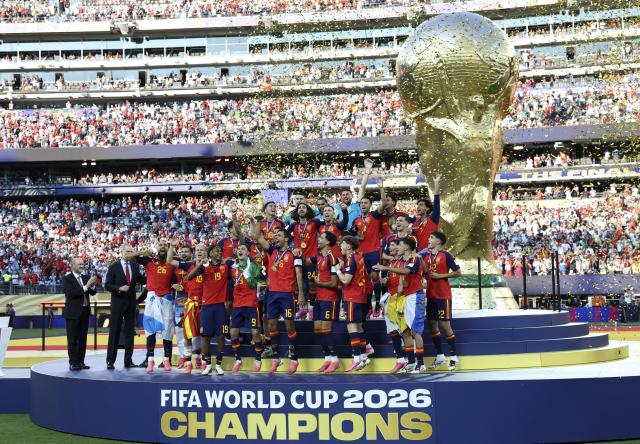 (260720) -- NEW JERSEY, July 20, 2026 (Xinhua) -- Team Spain celebrate during the awarding ceremony after the final match between Spain and Argentina at the 2026 FIFA World Cup at the New York New Jersey Stadium, the United States, July 19, 2026. (Xinhua/Li Ming)