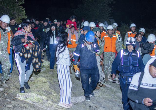 (260720) -- CHUPACA, July 20, 2026 (Xinhua) -- Rescuers evacuate people after an earthquake in Chupaca province, Junin, Peru, July 18, 2026. At least five people were killed after an earthquake struck Peru's central department of Junin Saturday night, local media reported Sunday. (Xinhua)