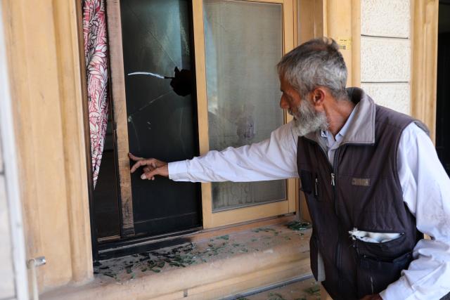 (260720) -- HEBRON, July 20, 2026 (Xinhua) -- A Palestinian inspects damages at a mosque after Israeli settlers set fire to a mosque and homes in the village of Al-Tuwani in Masafer Yatta, southern West Bank city of Hebron, on July 19, 2026. (Photo by Mamoun Wazwaz/Xinhua)