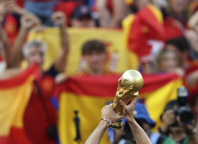 (260720) -- NEW JERSEY, July 20, 2026 (Xinhua) -- The World Cup trophy is lifted during the awarding ceremony after the final match between Spain and Argentina at the 2026 FIFA World Cup at the New York New Jersey Stadium, the United States, July 19, 2026. (Xinhua/Li Ming)
