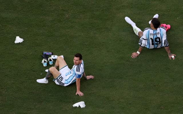 (260720) -- NEW JERSEY, July 20, 2026 (Xinhua) -- Nicolas Otamendi (R) and Lionel Messi of Argentina react after the final match between Spain and Argentina at the 2026 FIFA World Cup at the New York New Jersey Stadium, the United States, July 19, 2026. (Xinhua/Hu Xingyu)