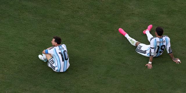 (260720) -- NEW JERSEY, July 20, 2026 (Xinhua) -- Nicolas Otamendi (R) and Lionel Messi of Argentina react after the final match between Spain and Argentina at the 2026 FIFA World Cup at the New York New Jersey Stadium, the United States, July 19, 2026. (Xinhua/Hu Xingyu)