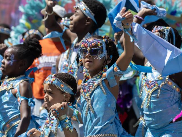 (260720) -- TORONTO, July 20, 2026 (Xinhua) -- Dressed-up children are seen during the Junior Carnival Parade of the 2026 Toronto Caribbean Carnival in Toronto, Canada, on July 19, 2026. Thousands of young participants in vivid costumes took part in the parade, celebrating Caribbean culture through music and dance. (Photo by Zou Zheng/Xinhua)