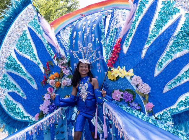 (260720) -- TORONTO, July 20, 2026 (Xinhua) -- A dressed-up girl with her float is pictured during the Junior Carnival Parade of the 2026 Toronto Caribbean Carnival in Toronto, Canada, on July 19, 2026. Thousands of young participants in vivid costumes took part in the parade, celebrating Caribbean culture through music and dance. (Photo by Zou Zheng/Xinhua)