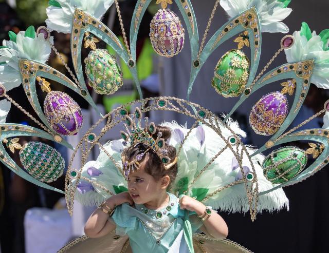 (260720) -- TORONTO, July 20, 2026 (Xinhua) -- A dressed-up girl is seen during the Junior Carnival Parade of the 2026 Toronto Caribbean Carnival in Toronto, Canada, on July 19, 2026. Thousands of young participants in vivid costumes took part in the parade, celebrating Caribbean culture through music and dance. (Photo by Zou Zheng/Xinhua)