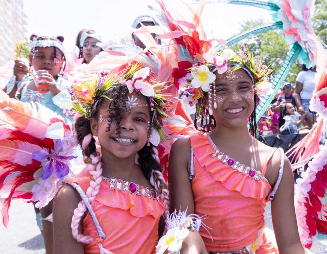 (260720) -- TORONTO, July 20, 2026 (Xinhua) -- Dressed-up girls are seen during the Junior Carnival Parade of the 2026 Toronto Caribbean Carnival in Toronto, Canada, on July 19, 2026. Thousands of young participants in vivid costumes took part in the parade, celebrating Caribbean culture through music and dance. (Photo by Zou Zheng/Xinhua)