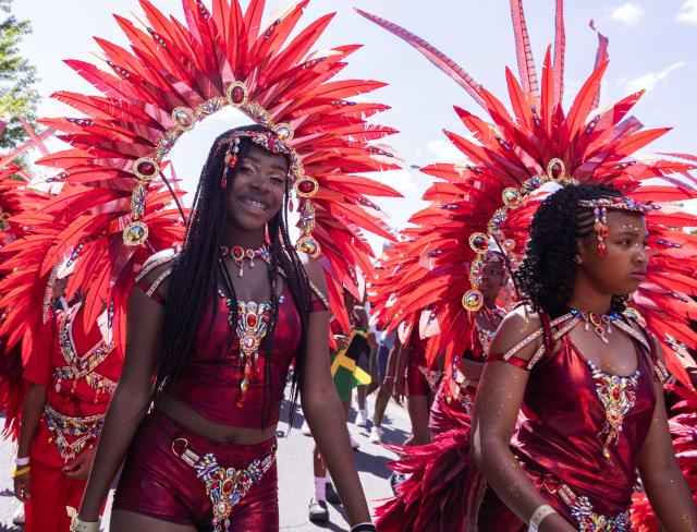 (260720) -- TORONTO, July 20, 2026 (Xinhua) -- Dressed-up girls are seen during the Junior Carnival Parade of the 2026 Toronto Caribbean Carnival in Toronto, Canada, on July 19, 2026. Thousands of young participants in vivid costumes took part in the parade, celebrating Caribbean culture through music and dance. (Photo by Zou Zheng/Xinhua)