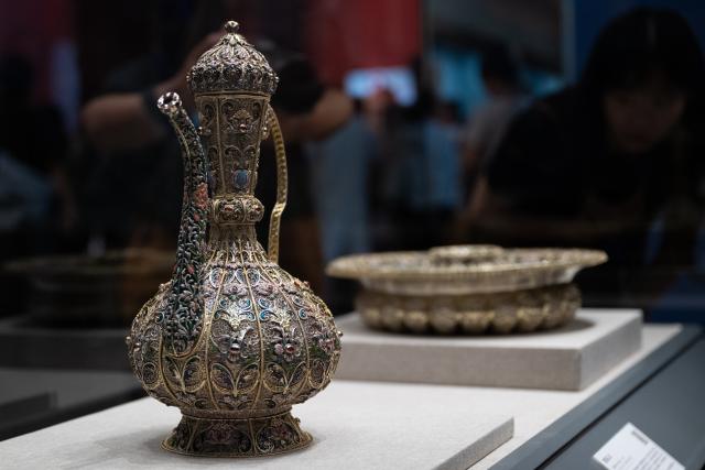 (260720) -- WUHAN, July 20, 2026 (Xinhua) -- Exhibits are displayed during the exhibition "Treasures of the Kremlin: From Peter the Great to Catherine the Great" at Hubei Provincial Museum in Wuhan, central China's Hubei Province, July 20, 2026. Jointly organized by Hubei Provincial Museum and the Moscow Kremlin Museums, the exhibition features 129 sets of precious artifacts dating from the 17th to 18th centuries, showcasing the rise, reforms and prosperity of the Russian Empire. (Xinhua/Du Zixuan)