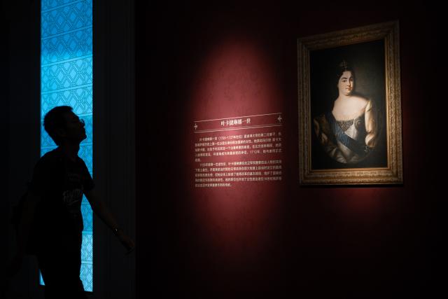 (260720) -- WUHAN, July 20, 2026 (Xinhua) -- A citizen visits the exhibition "Treasures of the Kremlin: From Peter the Great to Catherine the Great" at Hubei Provincial Museum in Wuhan, central China's Hubei Province, July 20, 2026. Jointly organized by Hubei Provincial Museum and the Moscow Kremlin Museums, the exhibition features 129 sets of precious artifacts dating from the 17th to 18th centuries, showcasing the rise, reforms and prosperity of the Russian Empire. (Xinhua/Du Zixuan)