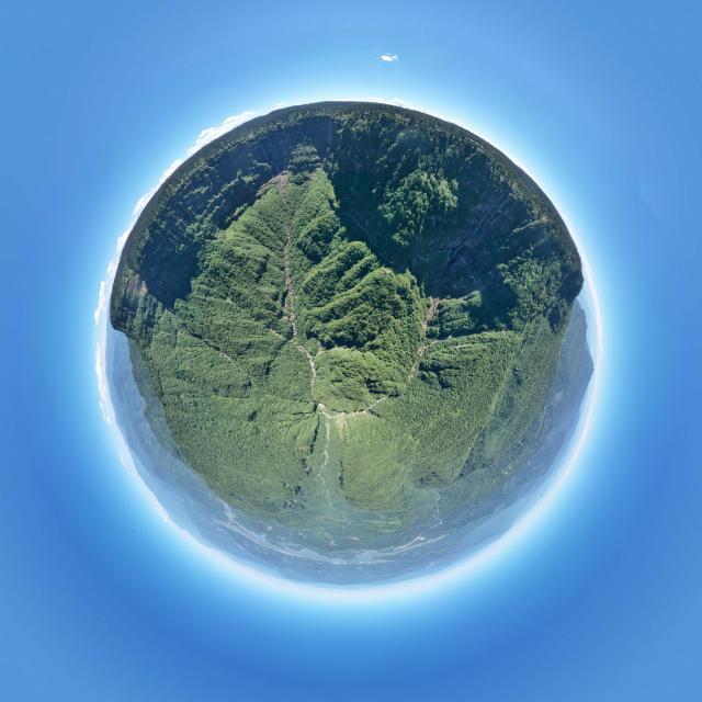 (260720) -- CHENGDU, July 20, 2026 (Xinhua) -- An aerial drone photo taken on July 19, 2026 shows a panorama view of the Wawu Mountain in Hongya County, southwest China's Sichuan Province. Known for its distinctive table-mountain landform, Wawu Mountain features a summit plateau covering about 11 square kilometers, making it a popular tourist destination. (Xinhua/Xu Bingjie)