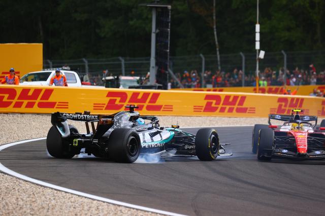 (260720) -- STAVELOT, July 20, 2026 (Xinhua) -- Mercedes' British driver George Russell (L) retires after the 1st Lap incident during the Formula One Belgian Grand Prix at the Spa-Francorchamps circuit in Stavelot, Belgium, on July 19, 2026. (Photo by Thomas Smets/Xinhua)