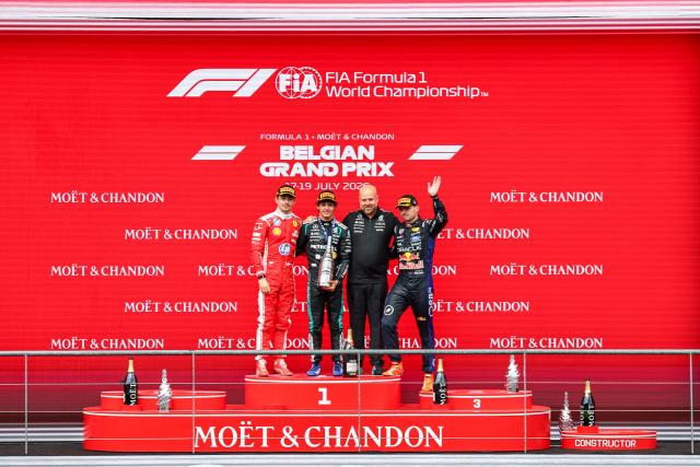 (260720) -- STAVELOT, July 20, 2026 (Xinhua) -- Winner Mercedes' Italian driver Kimi Antonelli(2nd L), 2nd place Ferrari's Monegasque driver Charles Leclerc(1st L), 3rd place Red Bull's Dutch driver Max Verstappen (1st R) and Mercedes' Operation Director Tom Batch pose for photos on the podium after the Formula One Belgian Grand Prix at the Spa-Francorchamps circuit in Stavelot, Belgium, on July 19, 2026. (Photo by Bao Di/Xinhua)