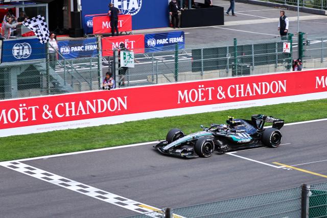 (260720) -- STAVELOT, July 20, 2026 (Xinhua) -- Mercedes' Italian driver Kimi Antonelli crosses the finish line and takes the win during the Formula One Belgian Grand Prix at the Spa-Francorchamps circuit in Stavelot, Belgium, on July 19, 2026. (Photo by Bao Di/Xinhua)