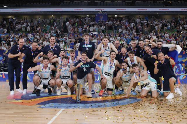 (260720) -- LJUBLJANA, July 20, 2026 (Xinhua) -- Team Slovenia pose after winning the final between Slovenia and Serbia at FIBA U20 EuroBasket 2026 in Ljubljana, Slovenia, July 19, 2026. (Photo by Zeljko Stevanic/Xinhua)