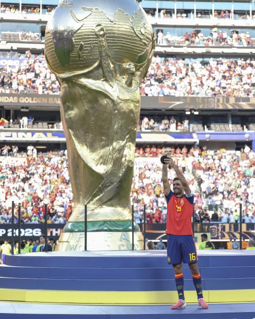 (260720) -- NEW JERSEY, July 20, 2026 (Xinhua) -- Rodri of Spain celebrates during the awarding ceremnoy after the final match between Spain and Argentina at the 2026 FIFA World Cup at the New York New Jersey Stadium, the United States, July 19, 2026. (Xinhua/Cao Can)