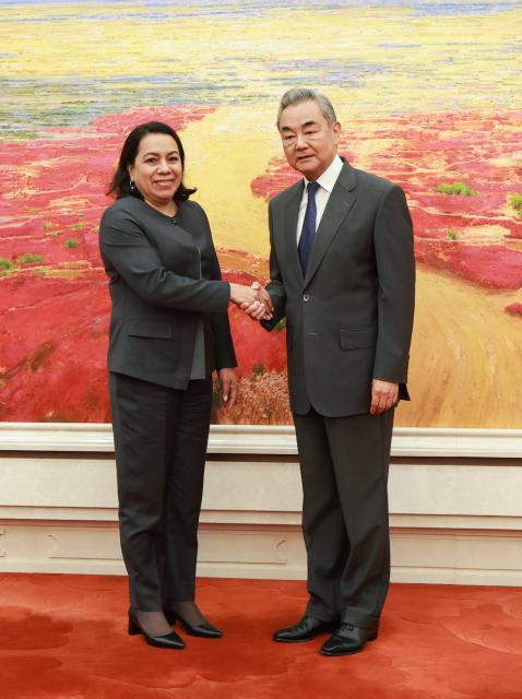 (260720) -- BEIJING, July 20, 2026 (Xinhua) -- Chinese Foreign Minister Wang Yi, also a member of the Political Bureau of the Communist Party of China Central Committee, meets with Carolyn Rodrigues-Birkett, Guyana's permanent representative to the United Nations and a candidate for the next UN secretary-general, in Beijing, capital of China, July 20, 2026. (Xinhua/Wang Ye)