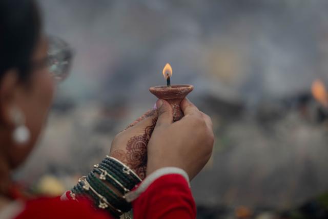 (260720) -- KATHMANDU, July 20, 2026 (Xinhua) -- A devotee offers prayers on the first Monday of the holy month of Shrawan at the Pashupatinath Temple in Kathmandu, Nepal, on July 20, 2026. The holy month of Shrawan is considered auspicious by Hindus, who worship Lord Shiva and offer prayers seeking blessings, peace, and prosperity. (Photo by Sulav Shrestha/Xinhua)