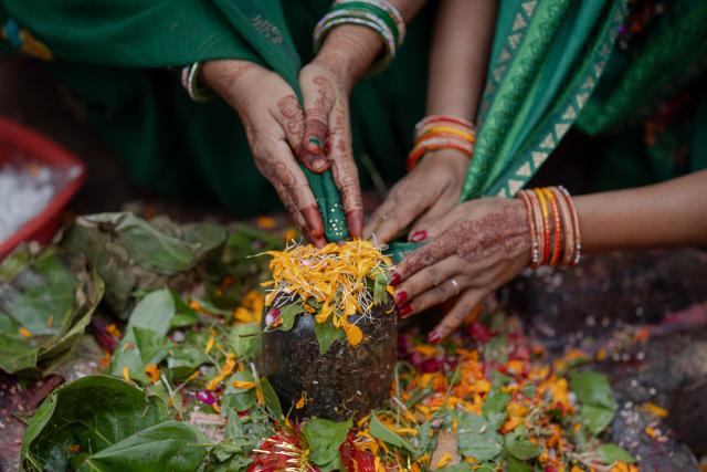 (260720) -- KATHMANDU, July 20, 2026 (Xinhua) -- Devotees offer prayers on the first Monday of the holy month of Shrawan at a Shiva temple in Kathmandu, Nepal, on July 20, 2026. The holy month of Shrawan is considered auspicious by Hindus, who worship Lord Shiva and offer prayers seeking blessings, peace, and prosperity. (Photo by Sulav Shrestha/Xinhua)