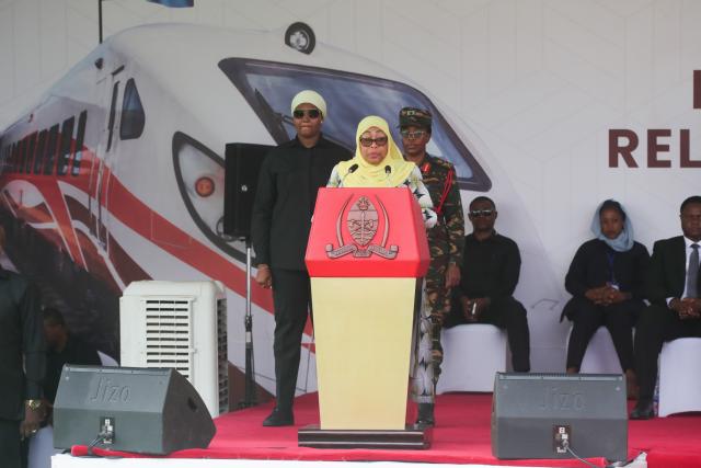(260720) -- KIGOMA, July 20, 2026 (Xinhua) -- Tanzanian President Samia Suluhu Hassan delivers a speech at the groundbreaking ceremony of the Chinese-built sixth section of the Standard Gauge Railway (SGR), connecting Tabora to Kigoma, in Kigoma, Tanzania, July 20, 2026. Hassan on Monday thanked Chinese enterprises for their contributions to the country's development efforts aimed at benefiting its people.
The project is being constructed by a joint venture of China Railway Construction Corporation (CRCC) and China Civil Engineering Construction Corporation (CCECC). (Photo by Emmanuel Herman/Xinhua)