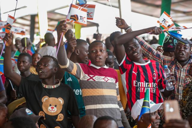 (260720) -- KIGOMA, July 20, 2026 (Xinhua) -- Local people wave flags during the groundbreaking ceremony of the Chinese-built sixth section of the Standard Gauge Railway (SGR), connecting Tabora to Kigoma, in Kigoma, Tanzania, July 20, 2026. Hassan on Monday thanked Chinese enterprises for their contributions to the country's development efforts aimed at benefiting its people.
The project is being constructed by a joint venture of China Railway Construction Corporation (CRCC) and China Civil Engineering Construction Corporation (CCECC). (Photo by Emmanuel Herman/Xinhua)