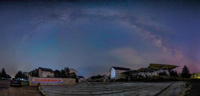 (260721) -- QIQIHAR, July 21, 2026 (Xinhua) -- This stitched photo taken on July 14, 2026 shows the Milky Way above Yichun, northeast China's Heilongjiang Province. (Photo by Li Jiaxing/Xinhua)