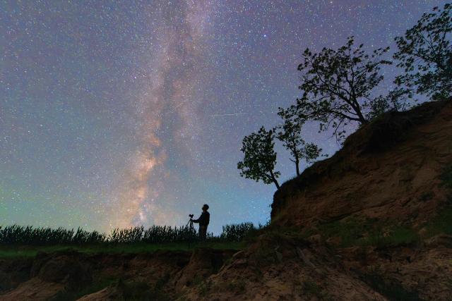 (260721) -- QIQIHAR, July 21, 2026 (Xinhua) -- This photo taken on July 21, 2026 shows the Milky Way above Fujin, northeast China's Heilongjiang Province. (Photo by Qu Yubao/Xinhua)
