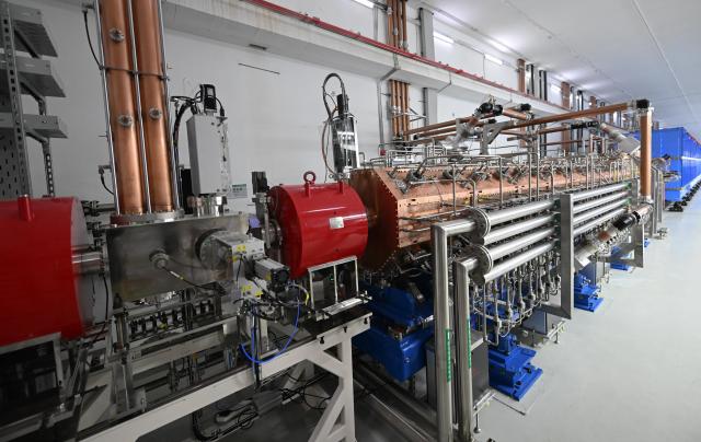 (260721) -- HUIZHOU, July 21, 2026 (Xinhua) -- This photo taken on July 20, 2026 shows a part of the High Intensity heavy-ion Accelerator Facility (HIAF) in Huizhou, south China's Guangdong Province. The High Intensity heavy-ion Accelerator Facility (HIAF), a major national science and technology infrastructure project in China, passed its technological acceptance review and entered trial operations on Tuesday in south China's Guangdong Province.
   Located in Guangdong's Huizhou City, the HIAF is a major national sci-tech infrastructure project led by the Institute of Modern Physics (IMP) under the Chinese Academy of Sciences. Construction began in December 2018, with over 6,000 large-scale equipment units, nearly 5 million component parts, and a total pipeline length exceeding 1 million meters.
   Once fully operational, the HIAF will provide heavy ion beams with the world's highest pulse intensity and the most precise multi-functional nuclear mass spectrometer. It will serve as a leading global research platform for exploring atomic nuclei limits, unraveling nuclear astrophysical processes, advancing nuclear energy development, and enabling multidisciplinary applications. (Xinhua/Deng Hua)