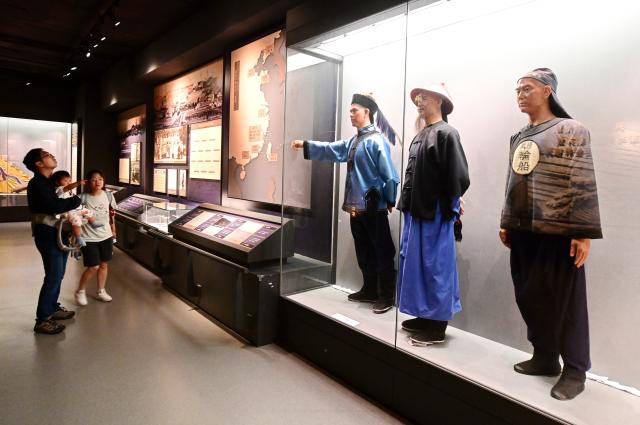 (260721) -- FUZHOU, July 21, 2026 (Xinhua) -- Tourists visit a museum inside the China Shipyard Culture Park in Fuzhou, southeast China's Fujian Province, June 2, 2026. The China Shipyard Culture Park, opened in 2023 on the site of a century-old shipbuilding complex, preserves a collection of historic industrial buildings. The park combines exhibitions, educational programs, performances and tourism, showcasing China's modern shipbuilding heritage. (Xinhua/Lin Shanchuan)