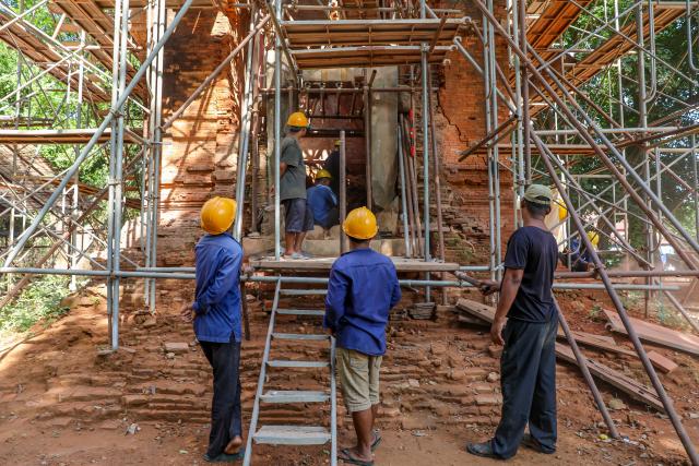 (260721) -- SIEM REAP, July 21, 2026 (Xinhua) -- Staff members work at the restoration site of a Bakong temple's tower in Siem Reap province, Cambodia, on July 10, 2026. Archaeologists are restoring the millennium-old brick towers of Bakong temple in Cambodia's Angkor Archaeological Park, the APSARA National Authority (ANA) said on Tuesday. (ANA/Handout via Xinhua)
