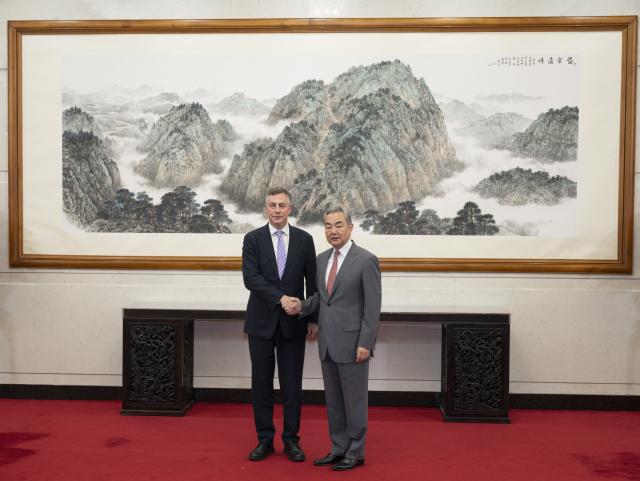 (260721) -- BEIJING, July 21, 2026 (Xinhua) -- Chinese Foreign Minister Wang Yi, also a member of the Political Bureau of the Communist Party of China Central Committee, meets with a cross-party delegation of the European Parliament, headed by David McAllister, chair of the Committee on Foreign Affairs, in Beijing, capital of China, July 21, 2026. (Xinhua/Cai Yang)