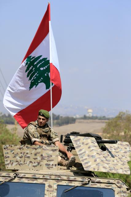 (260721) -- ZAWTAR AL-GHARBIYA, July 21, 2026 (Xinhua) -- A soldier of Lebanese army guards at the town of Zawtar al-Gharbiya in southern Lebanon on July 21, 2026. Units of the Lebanese army on Tuesday began deploying in the town of Zawtar al-Gharbiya in southern Lebanon following the withdrawal of Israeli forces from the area, a Lebanese security source and eyewitnesses told Xinhua. (Photo by Ali Hashisho/Xinhua)